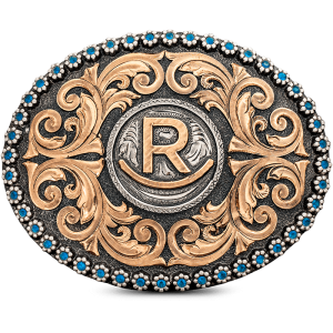 A custom belt buckle for men featuring a golden bronze ranch brand, adorned with scrolls and coloured berries on a matted german silver base 